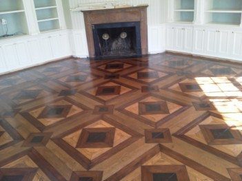 Artek Hardwood Flooring with fireplace