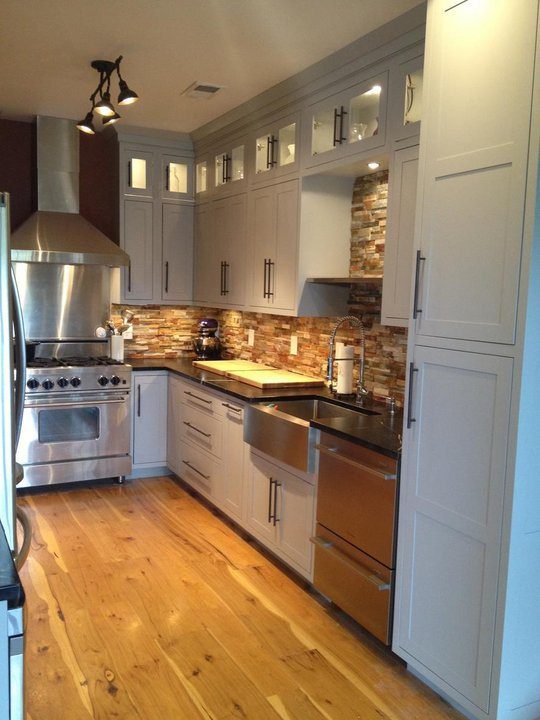 small kitchen with wide plank floor