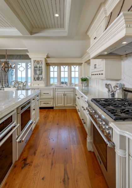 Custom Hickory | Ogunquit, ME | ID#10763 Carlisle random width hickory flooring adds warmth to this kitchen.