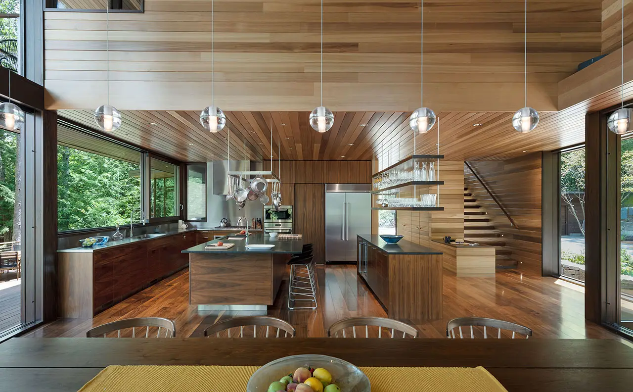 Modern open-concept kitchen with Carlisle Walnut flooring
