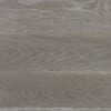 Gray wide plank wood surface with subtle horizontal grain, natural wear.