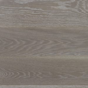 Gray wide plank wood surface with subtle horizontal grain, natural wear.