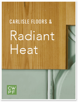 Wood floor panel above heating system with Carlisle branding.