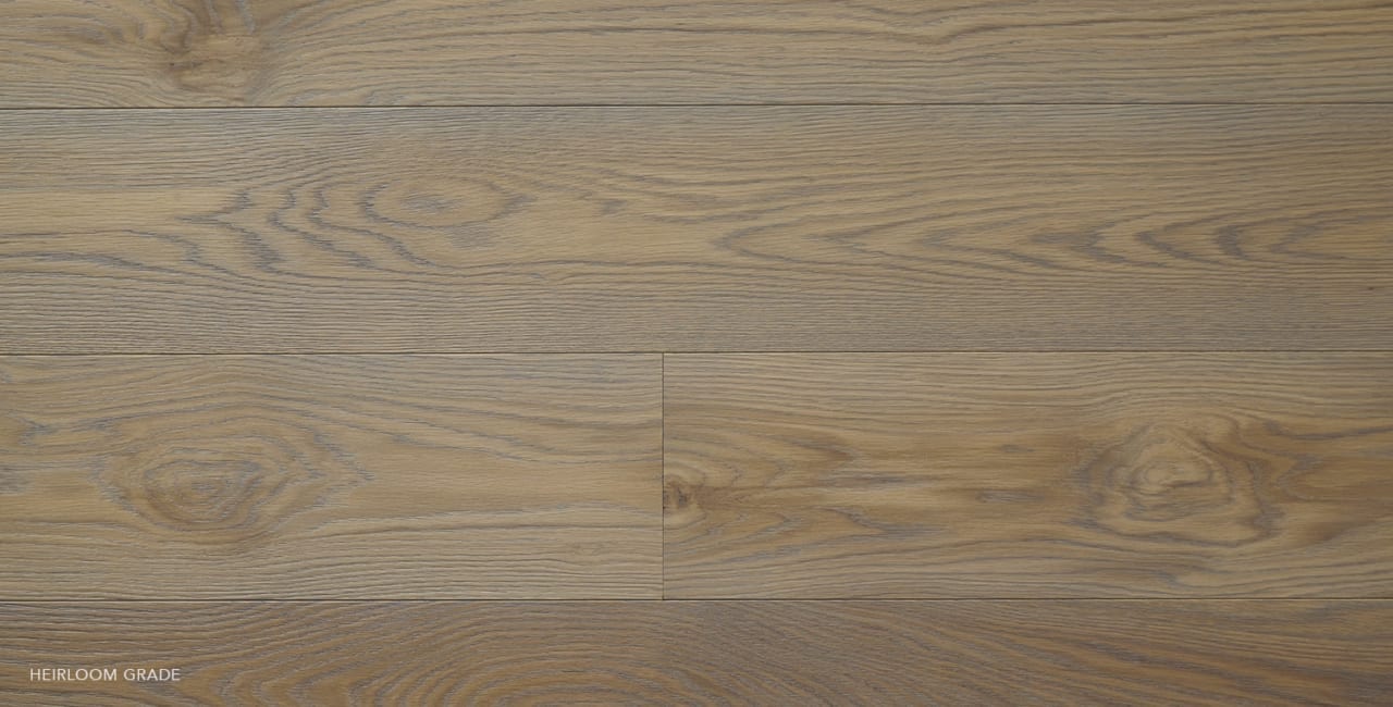 Wide plank flooring with light and dark brown grain, creating a natural, rustic texture.