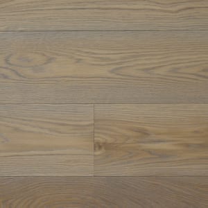Wide plank flooring with light and dark brown grain, creating a natural, rustic texture.