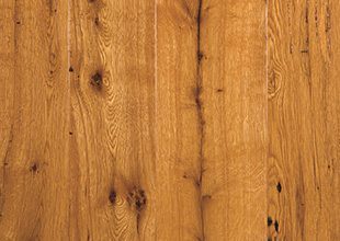 Vertical wooden planks with natural grain in a rustic tone.
