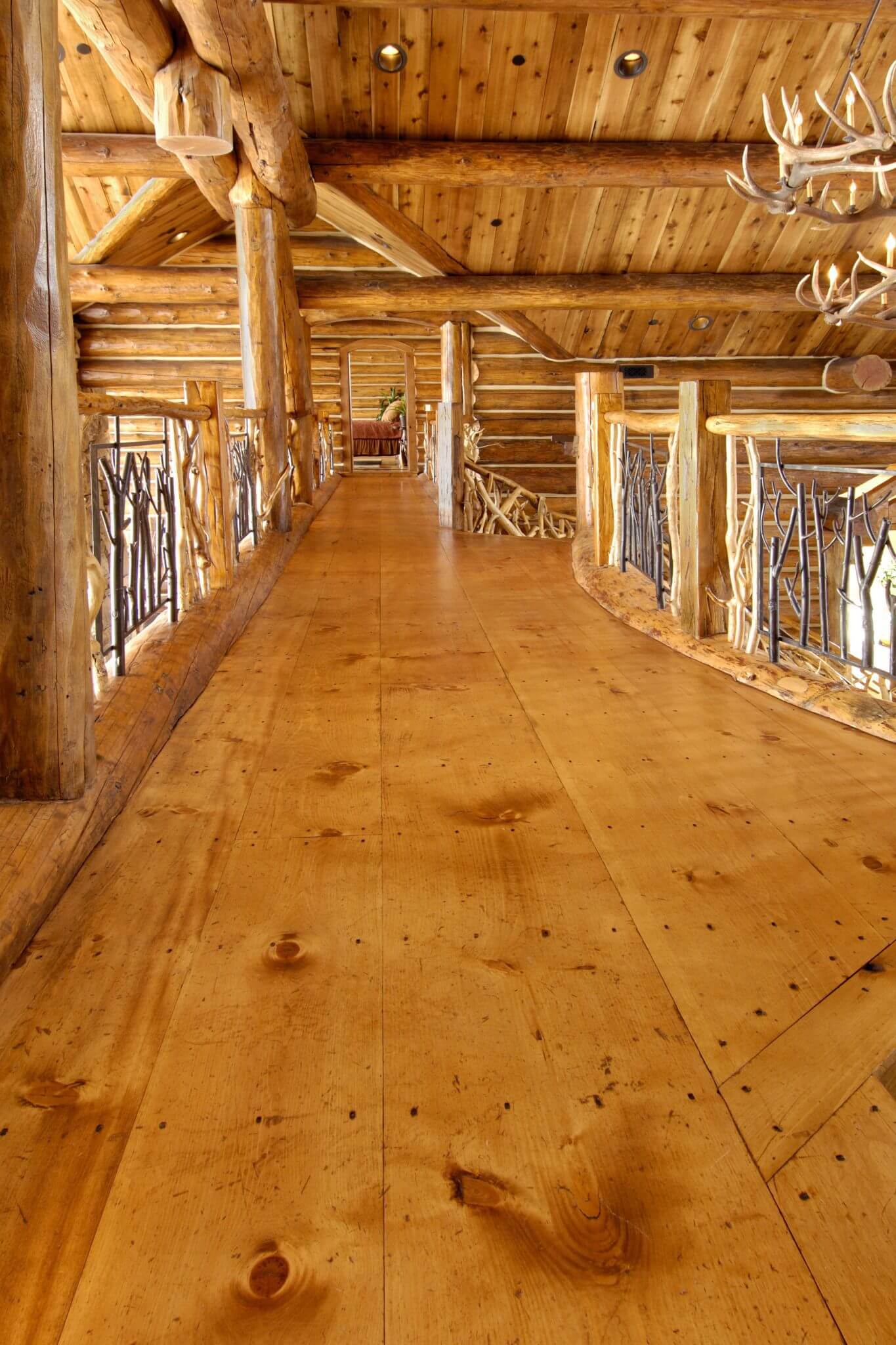 pine flooring in long hallway