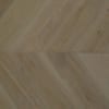 Herringbone wide plank flooring with varied texture and brown tones.