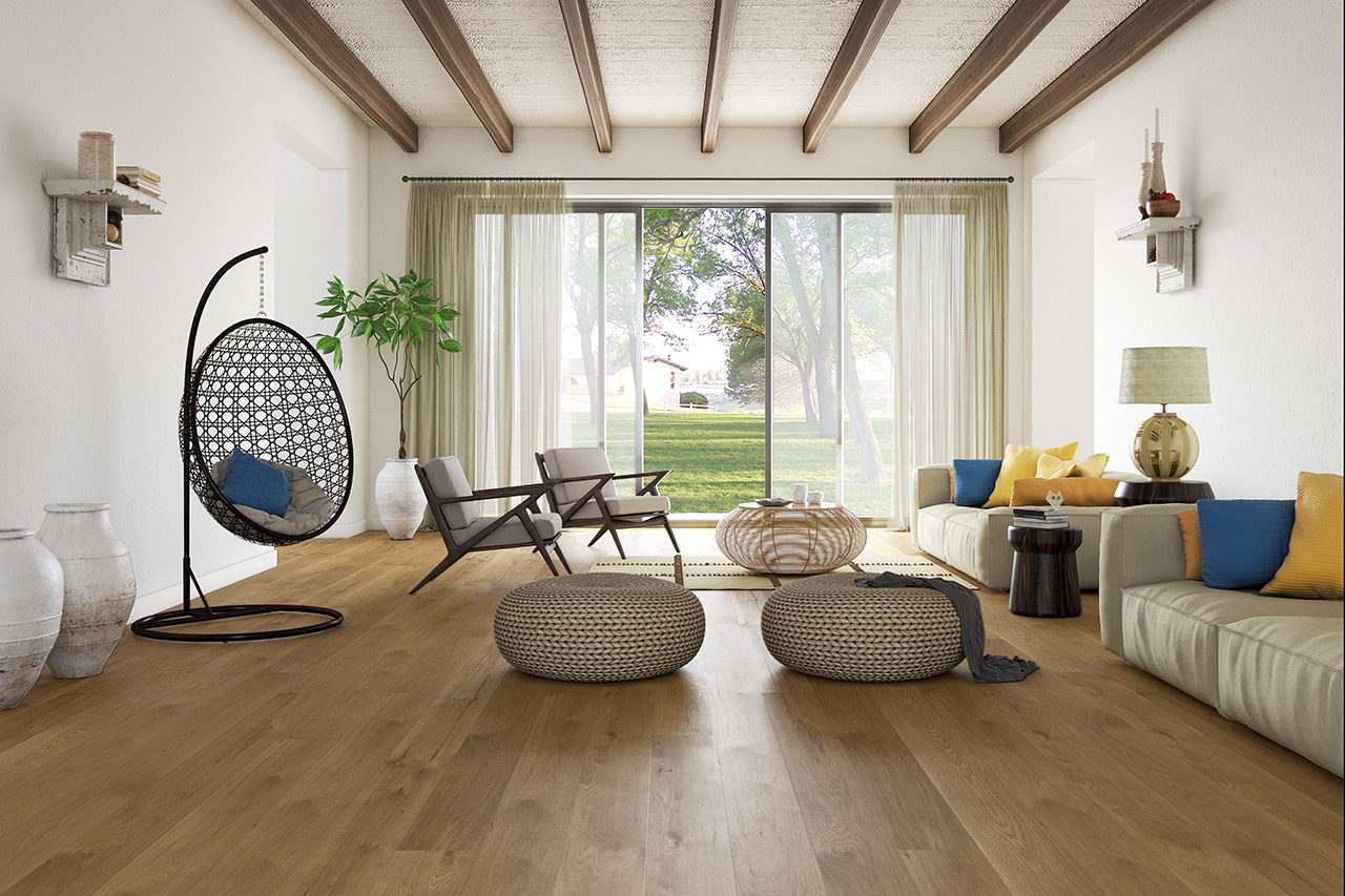 Cozy living room with hanging chair, garden view, wide plank flooring.