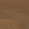 Light brown wide plank flooring with faint natural wood grain, creating a seamless surface.