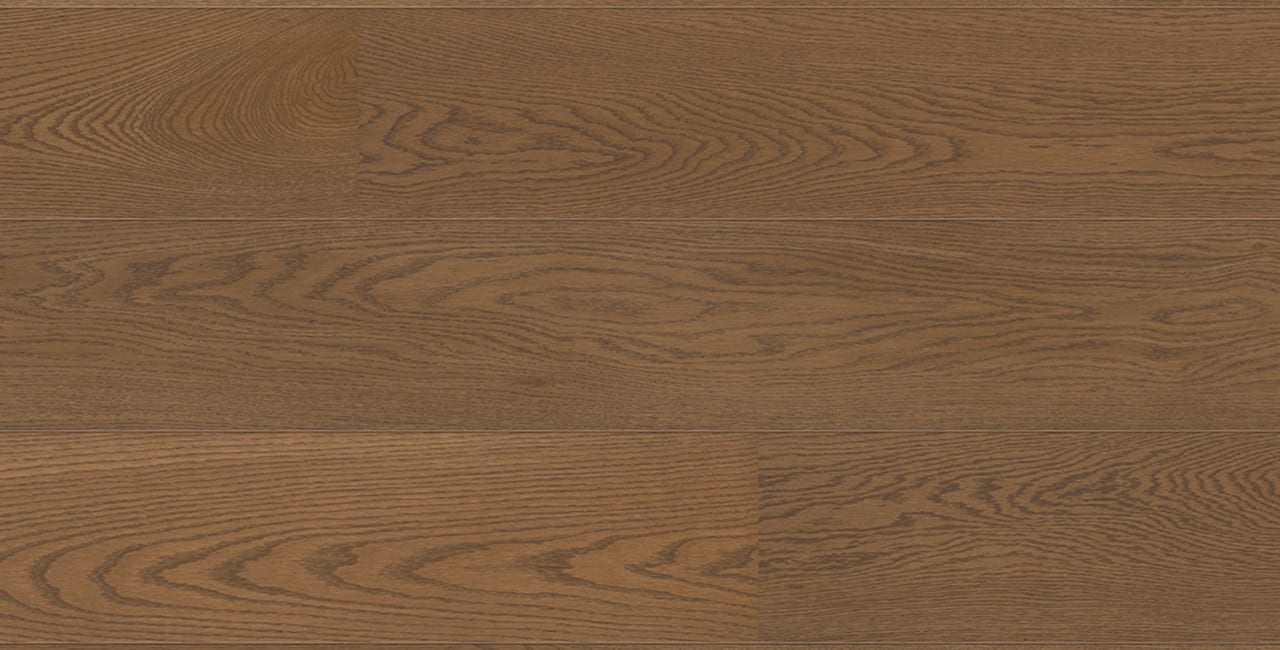 Light brown wide plank flooring with faint natural wood grain, creating a seamless surface.
