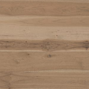 Horizontal wide plank flooring in light brown tones with smooth, natural texture.