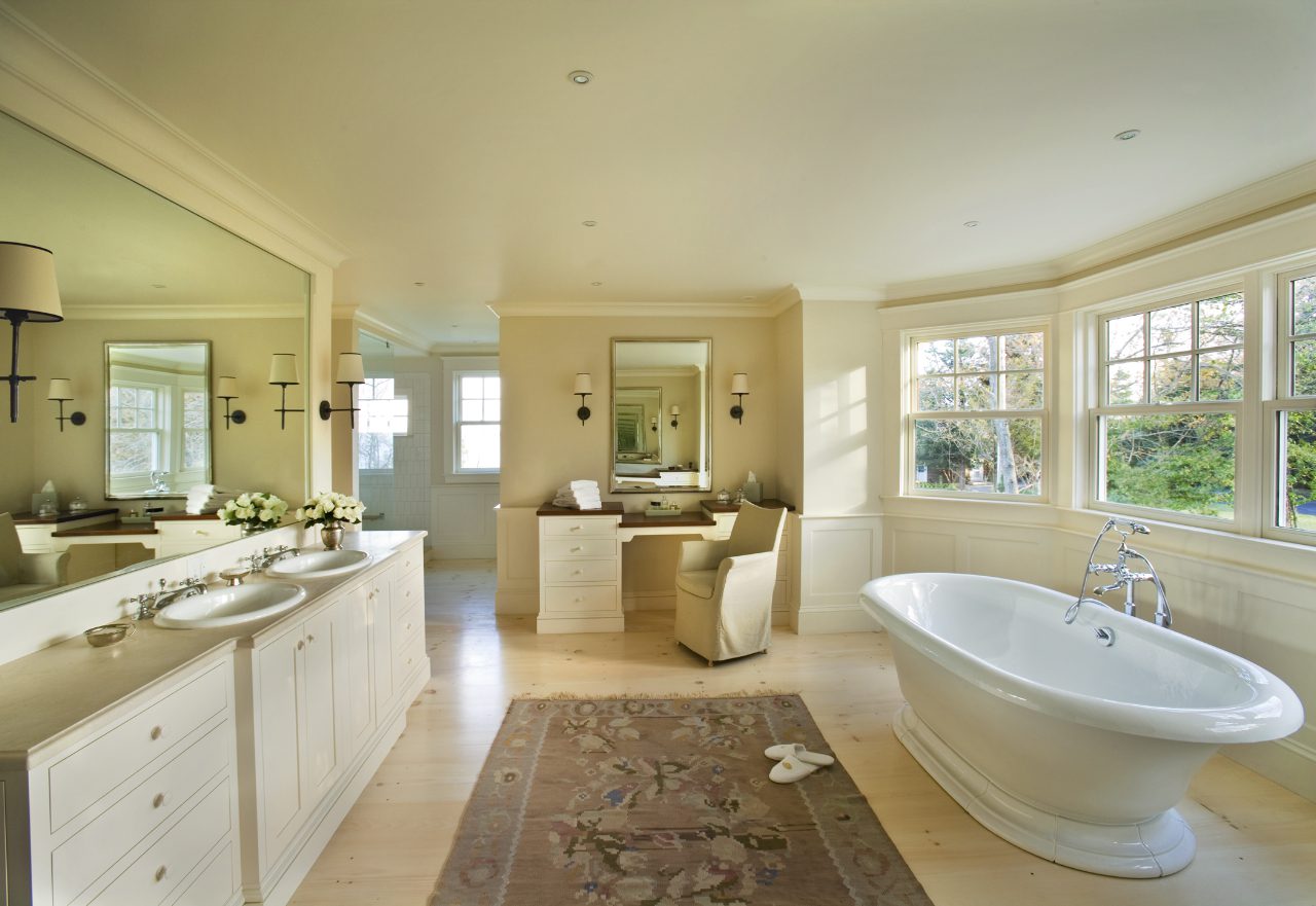 light flooring in bathroom with rug