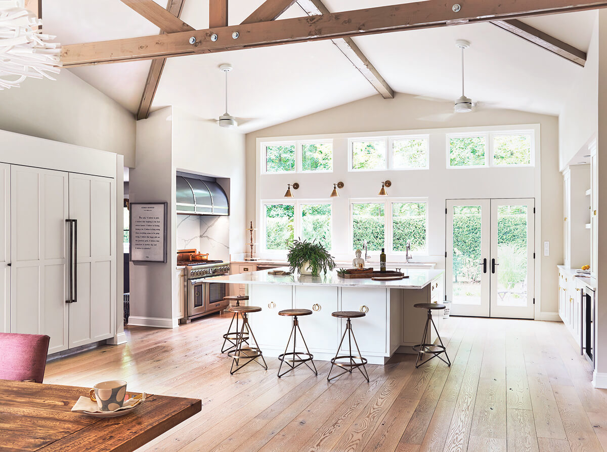 brown floor white kitchen