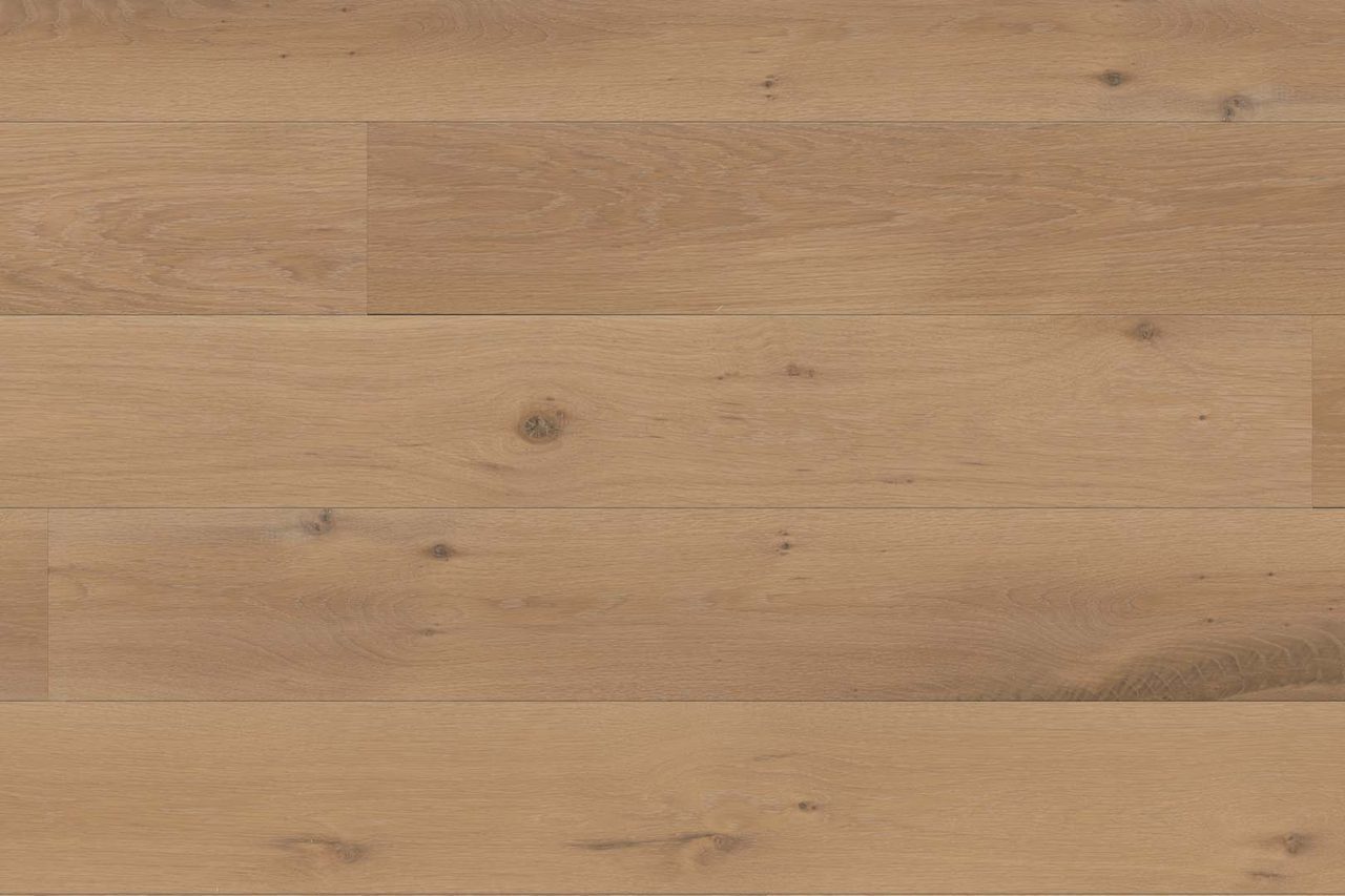 Warm-toned wooden surface with grain patterns, forming a rustic wide plank floor.