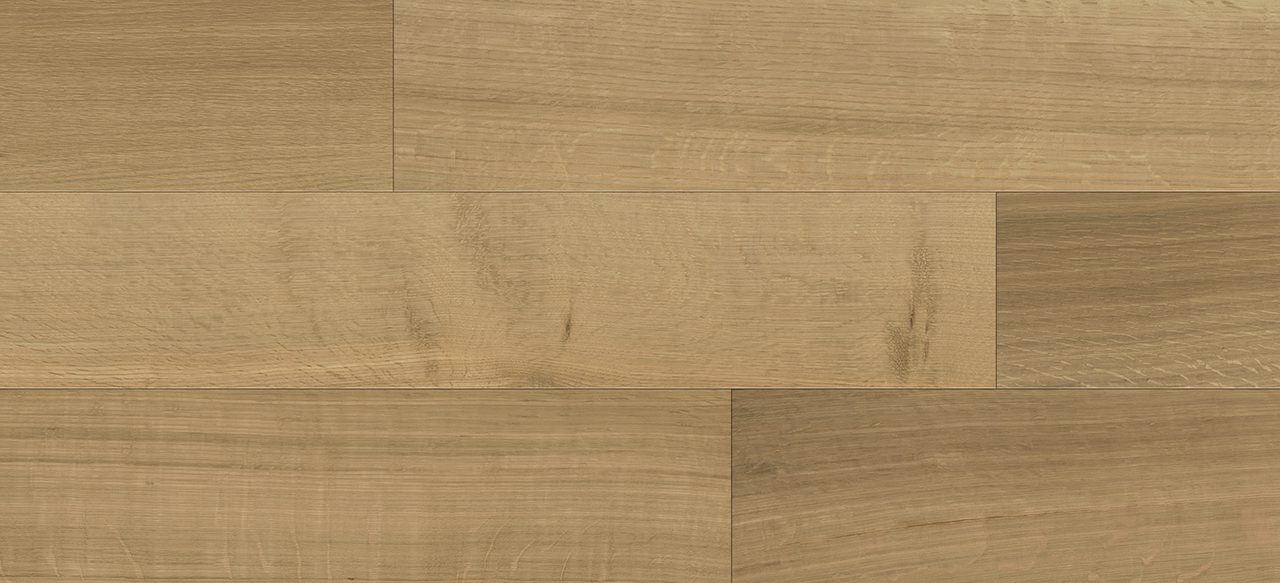 Light brown wide plank flooring featuring rectangular planks for a natural, seamless texture.