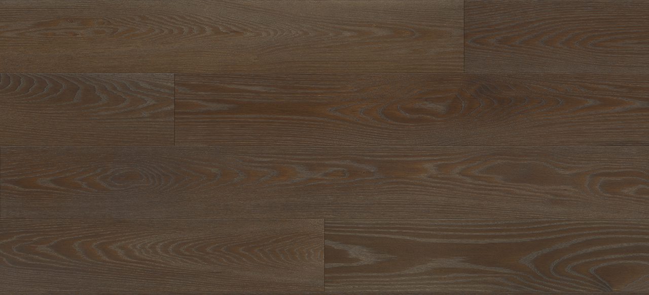 Wide plank flooring with dark brown hues and distinctive wood grain for a warm, inviting atmosphere.