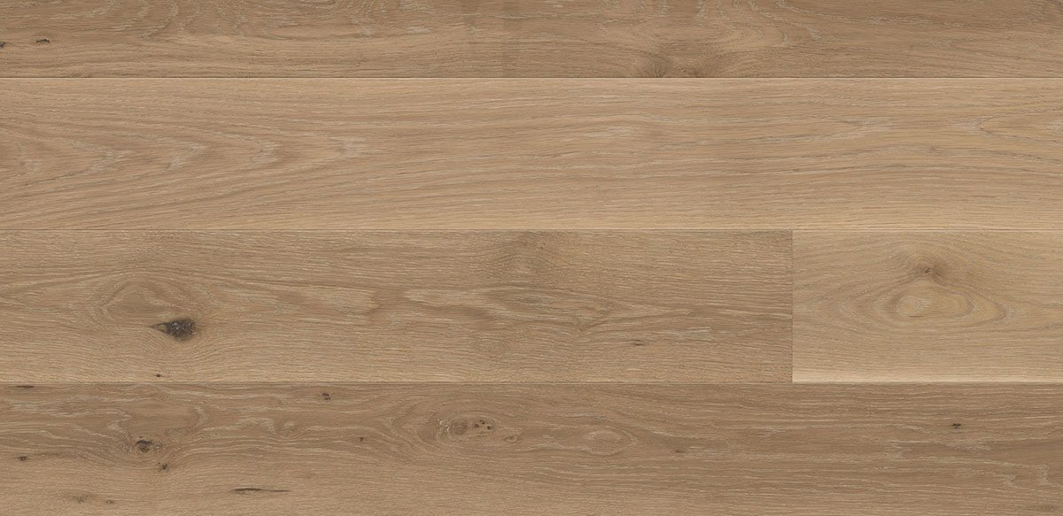Close-up of wooden surface with natural grain on wide plank flooring, shades of light brown, rustic ambiance.