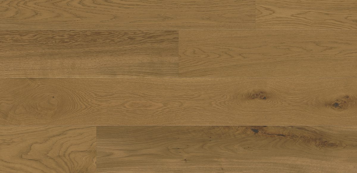 Light brown wide plank surface with natural grain, flooring or tabletop.